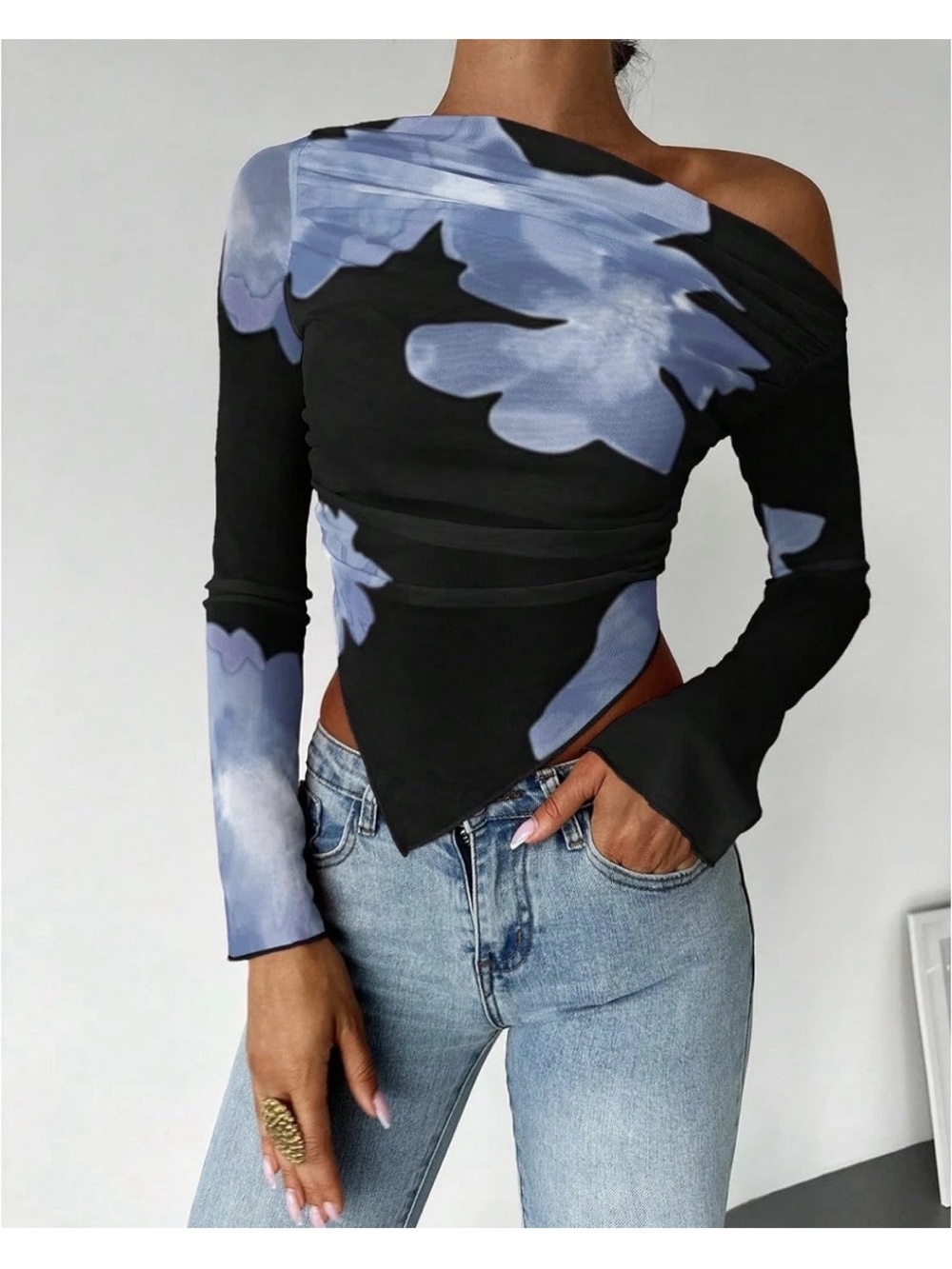 Asymmetric Off-Shoulder Black Crop Top with Blue Floral Print
